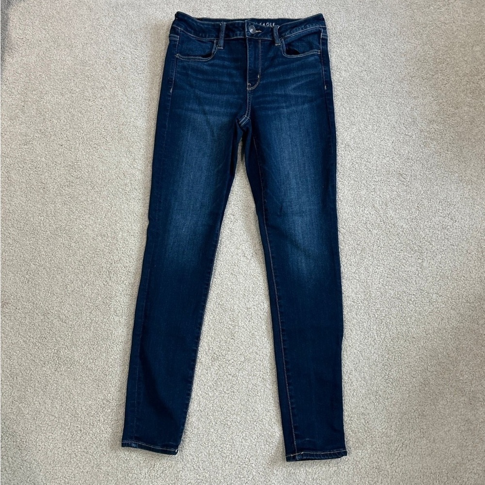 American eagle next level stretch dark wash solid blue jeans in size 10 long